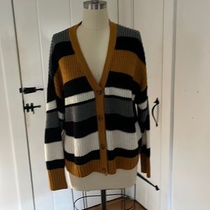 Woman’s Stripe Sweater.  Sophisticated and high fashion!  Colors are beautiful!